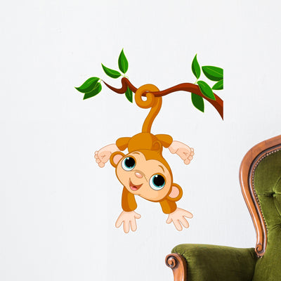 Baby Monkey Tree Wall Decal shown on a wall