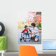 Teen boy with disabled little brother in walker Wall Mural