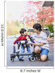 Teen boy with disabled little brother in walker Wall Mural