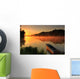 Boat on the shore of a misty lake Wall Mural