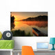 Boat on the shore of a misty lake Wall Mural