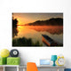 Boat on the shore of a misty lake Wall Mural