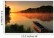 Boat on the shore of a misty lake Wall Mural