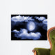 The moon in the night sky in clouds Wall Mural
