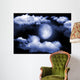 The moon in the night sky in clouds Wall Mural