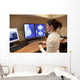 Radiology Technician Looking Mammography