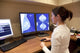 Radiology Technician Looking Mammography