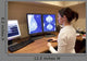 Radiology Technician Looking Mammography