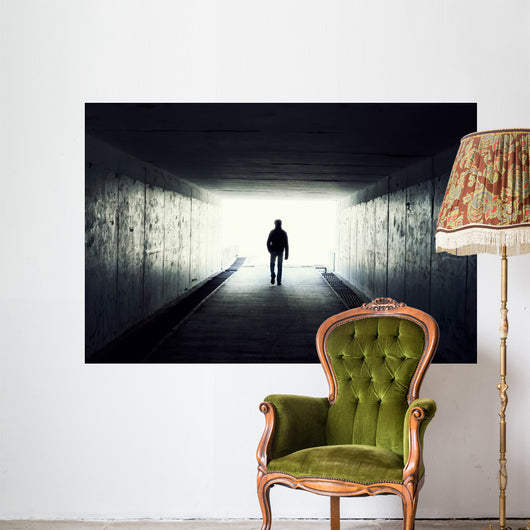 Silhouette of Man Walking in Tunnel Wall Mural