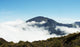 Clouds Creeping up Wall Mural