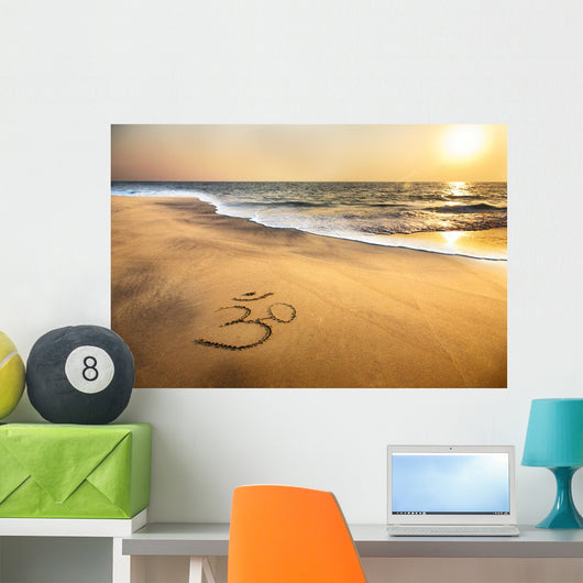 Om symbol on the beach Wall Mural