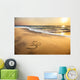 Om symbol on the beach Wall Mural