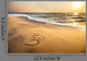 Om symbol on the beach Wall Mural