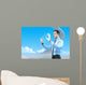 Businessman using futuristic hologram interface keyboard Wall Mural