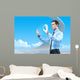 Businessman using futuristic hologram interface keyboard Wall Mural