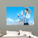 Businessman using futuristic hologram interface keyboard Wall Mural