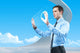 Businessman using futuristic hologram interface keyboard Wall Mural
