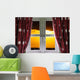 Sunset through a secure window with curtains Wall Mural