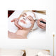 Woman Receiving Facial Mask