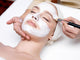Woman Receiving Facial Mask