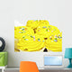 Several yellow cupcakes Wall Mural
