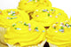 Several yellow cupcakes Wall Mural