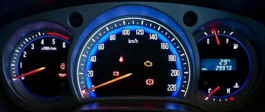 Modern car illuminated dashboard closeup Wall Mural