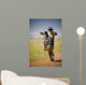 motocross rider on back wheel Wall Mural
