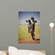 motocross rider on back wheel Wall Mural