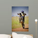 motocross rider on back wheel Wall Mural