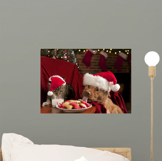 Cat and Dog Devouring Santas Cookies Wall Mural