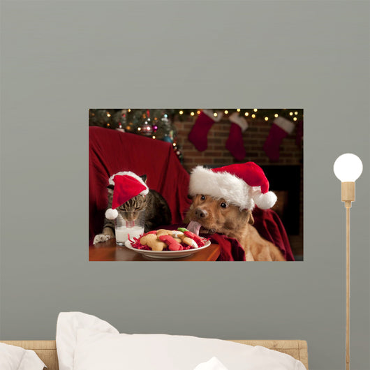 Cat and Dog Devouring Santas Cookies Wall Mural