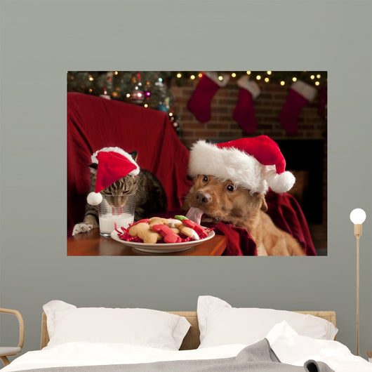 Cat and Dog Devouring Santas Cookies Wall Mural