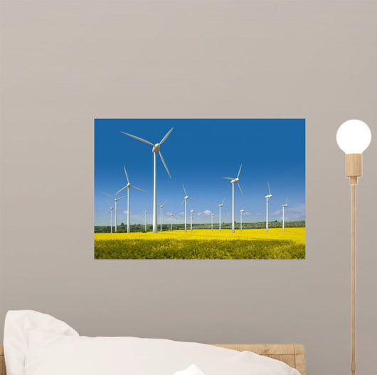 Wind turbines in a rapeseed field Wall Mural