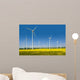 Wind turbines in a rapeseed field Wall Mural
