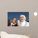 Elderly couple laughing at ice cream accident Wall Mural