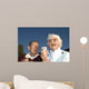 Elderly couple laughing at ice cream accident Wall Mural