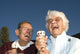 Elderly couple laughing at ice cream accident Wall Mural