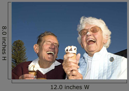 Elderly couple laughing at ice cream accident Wall Mural