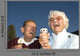 Elderly couple laughing at ice cream accident Wall Mural