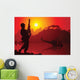 Soldier with crashed helicopter on the background Wall Mural