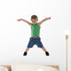 happy little boy with hands in air Wall Decal