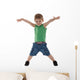 happy little boy with hands in air Wall Decal