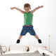 happy little boy with hands in air Wall Decal