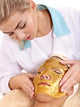 Girl with Gold Facial