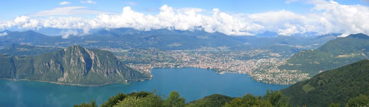 urban city on the bank of the lake, lugano lake, switzerland, pa Wall Mural