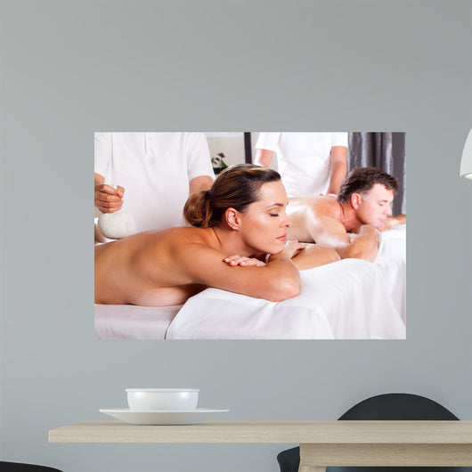couple having massage Wall Mural
