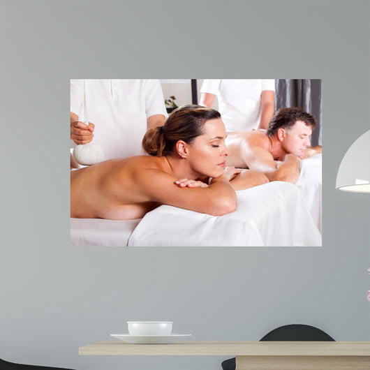 couple having massage Wall Mural