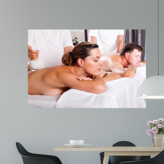 couple having massage Wall Mural