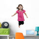 Adorable little girl jumping in air. isolated on white backgrou Wall Decal